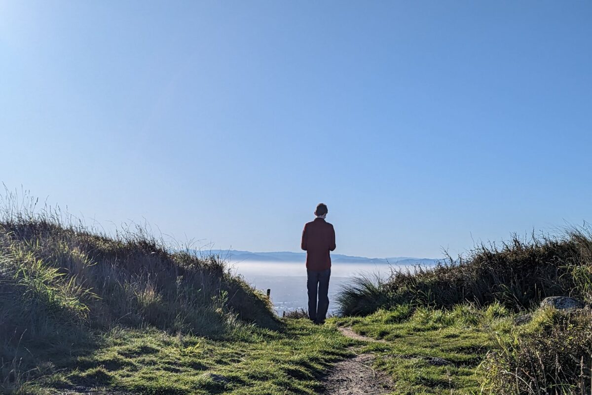 Aren Elliott looks at the Pacific from Sugarloaf Scenic Preserve in Christchurch, New Zealand. Photo by Christopher Elliott -  - Must Travel Destination 