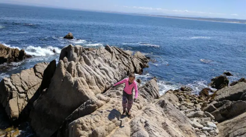 Erysse Elliott on the rocks in Monterey, Calif., in 2017.
