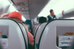 airplane, plane, interior, flight, crew, attendant, seatback, row, united