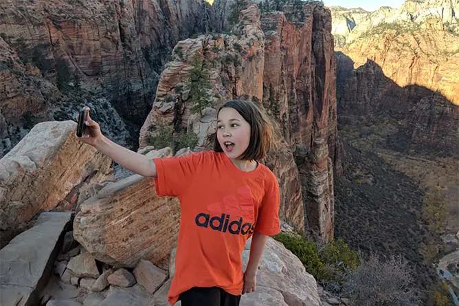 Erysse Elliott takes a selfie near the summit of Angel's Landing in Utah.