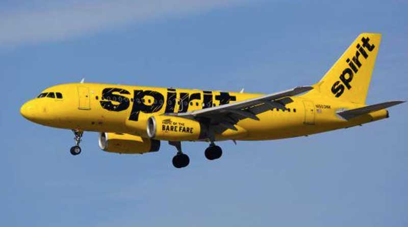 Can she get a Spirit Airlines voucher extension using our company contacts?