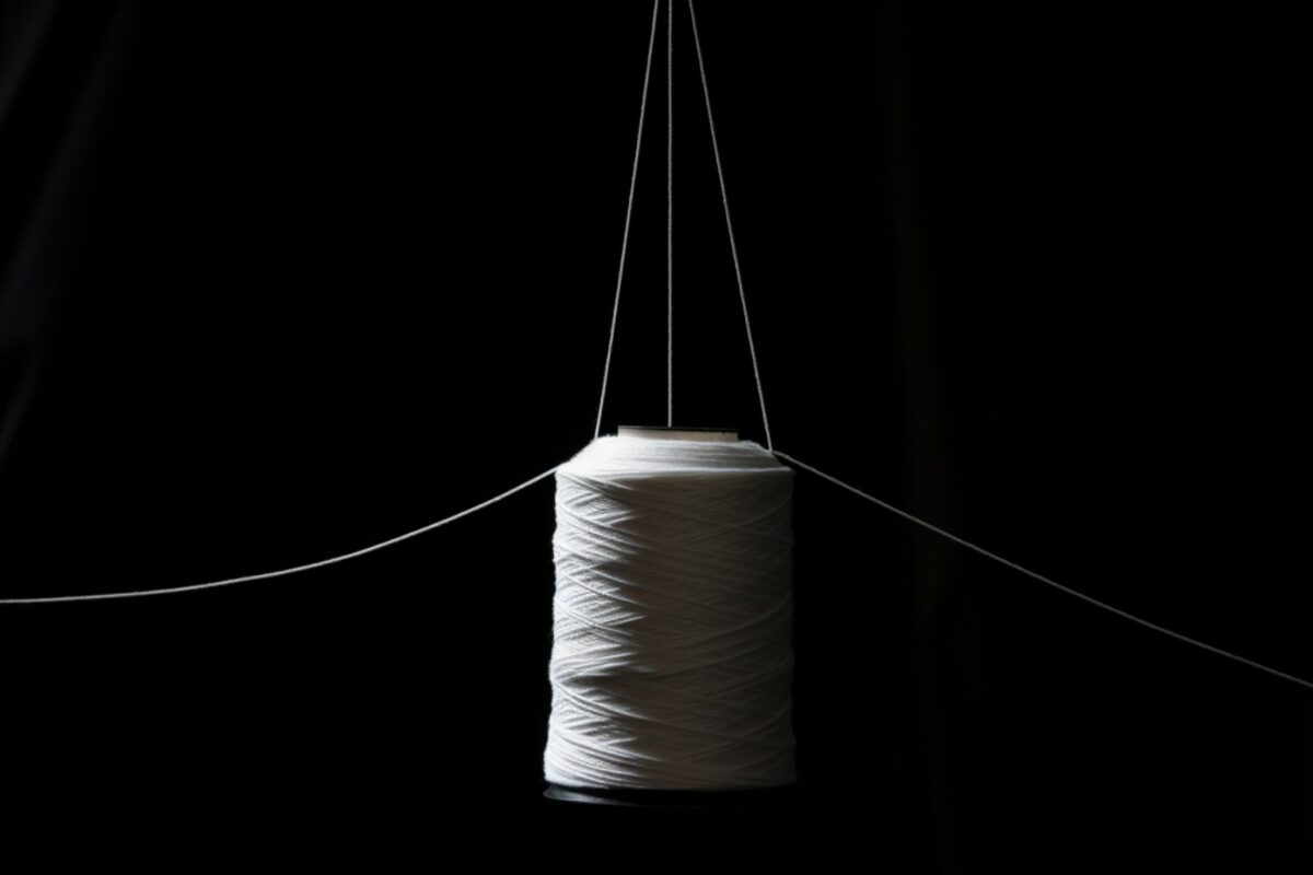 A loom with strings attached.