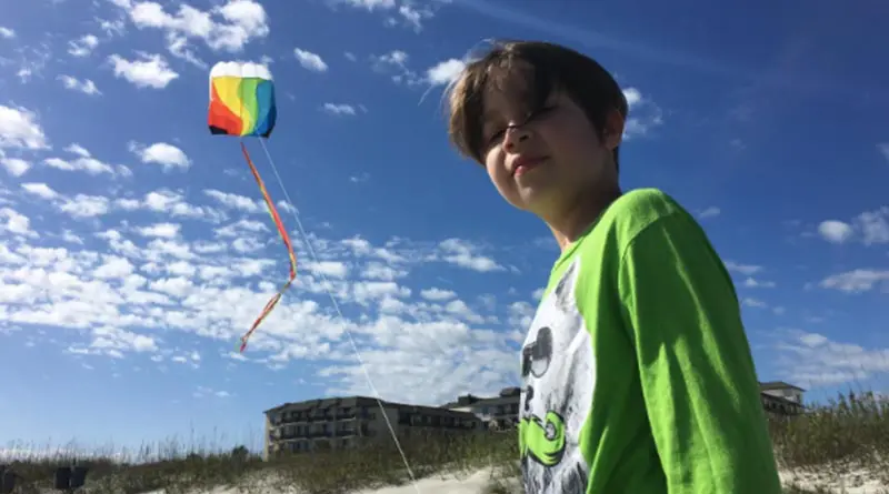Iden Elliott flies a kite on Jekyll Island in 2015. When people visit Orlando, they don't think of this Georgia island. But it's close -- and affordable.